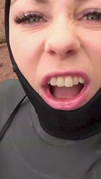 Wetsuit Giantess Finds a Tiny Toy to Tease