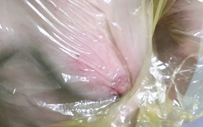 Bouncy Tits Action: Tits wrapped in foil and squeezing it