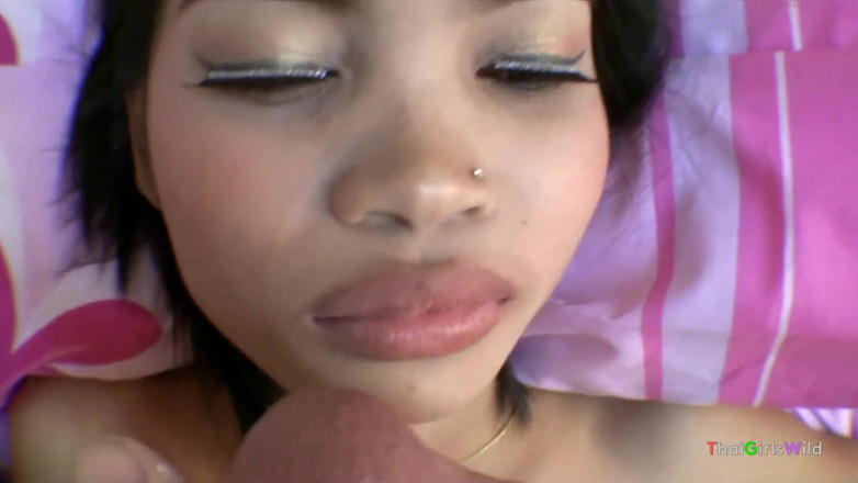 Thai Girls Wild: Dropping warm jizz on a pretty Thai girl's face