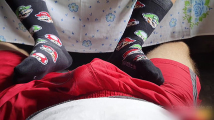 College-couple: Footjob over shorts, cum through clothes footjob, sockjob