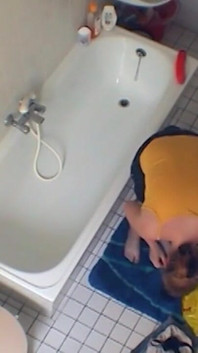 Sexy chubby amateur fucks herself in the bathroom