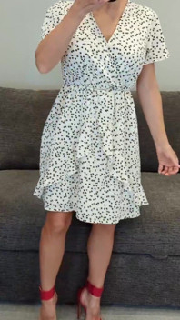 Sadie in a White Dress with Hearts and Red Heels