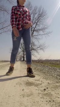 Desperate Girl with Full Bladder Has to Pee on a Dirt Road