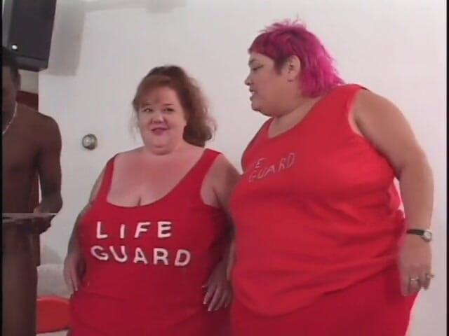 Hot and Wet: Four oiled chubbettes press one thin black guy