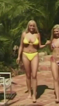 Two Busty Blondes in Bikinis Have Their Lesbian Sexy Time in the Pool