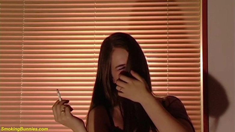 Smoking Bunnies: Busty young chick smoking cigarette