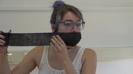 Restricting Ropes: Gagging herself with socks up close