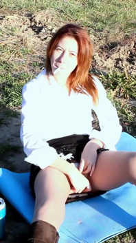 Redhead with Miniskirt Shows Her Pussy in Pantyhose Outdoor While Smoking