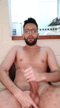 Jerking my big uncut cock with lube until I cum