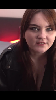 Pretty Woman in a Leather Jacket Dancing Before Sex