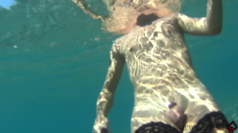 Nylondelux: Black Stocking and Anal Beads in the Sea