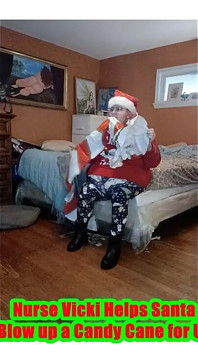 Nurse Vicki Blows up Huge Candy Cany for Santa!