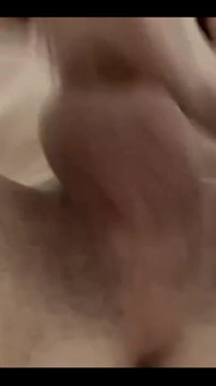 Masturbating