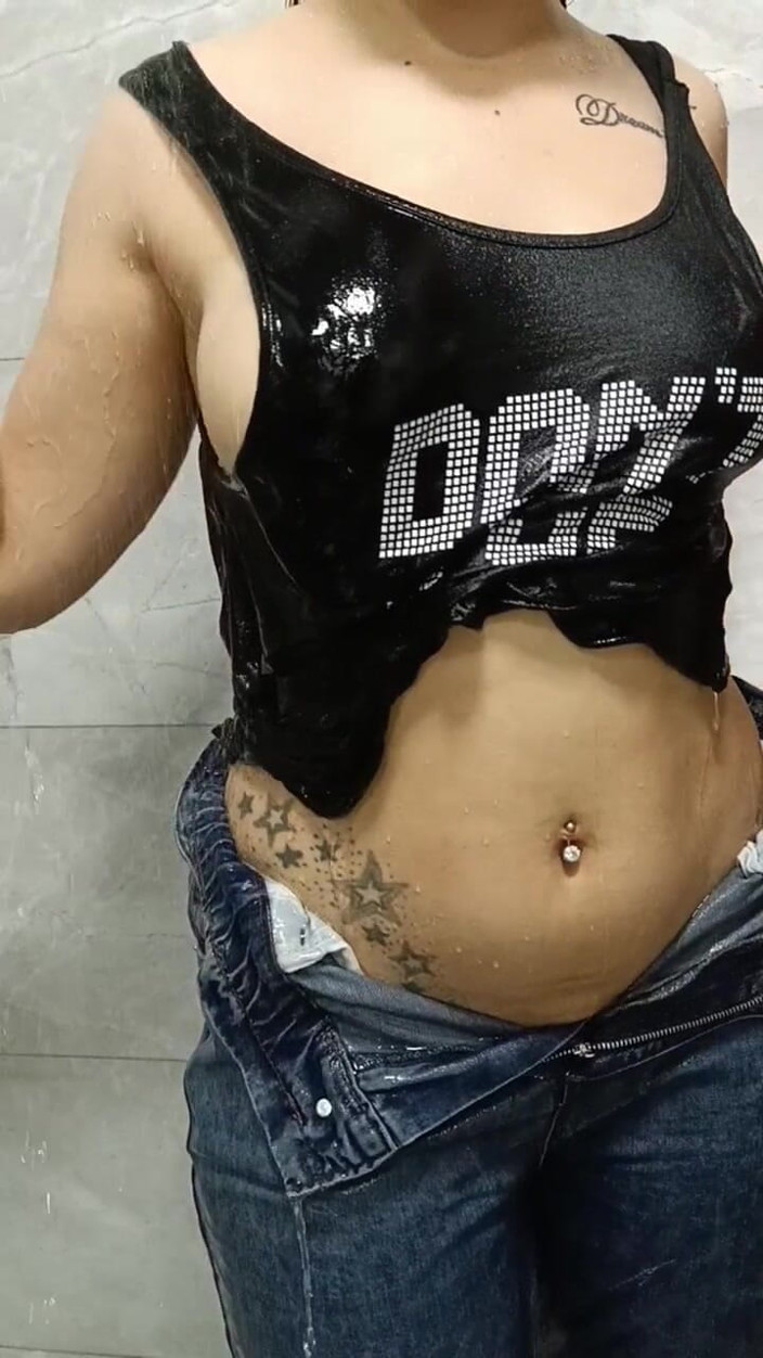 Esmer Tarcin: Sexy Show Getting Wet in the Shower in Clothes