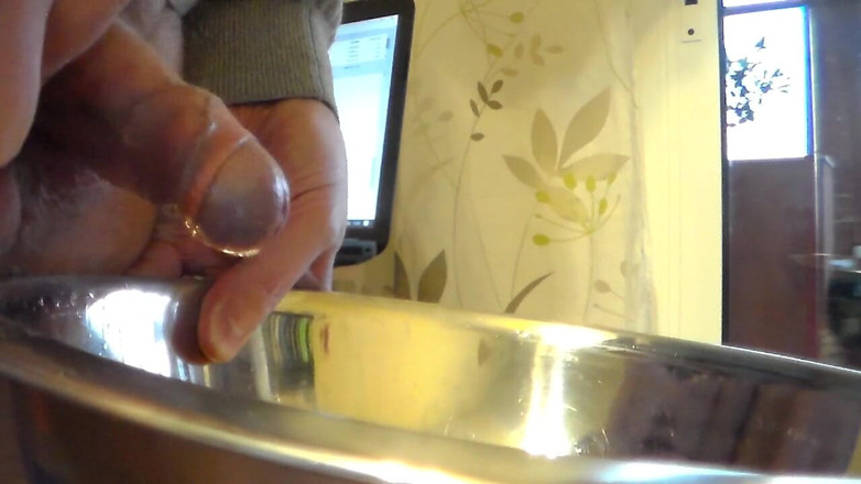 Sex hub male: Closeup of John peeing into a steel bowl