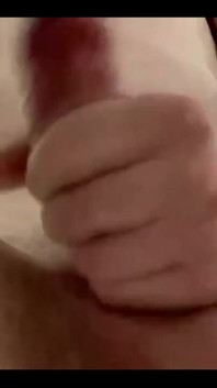 Masturbating