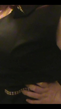 Robe-wearing Dominatrix