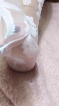 Aguanta los pies blancos de nylon