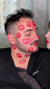 Red Lipstick Kisses Cover His Entire Face