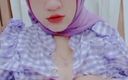 Shine-X: Le hijab violet viral d’une femme de Kuala Lumpur lui...
