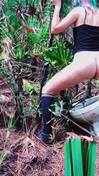 Peeing on a Toilet in the Woods