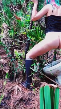 Peeing on a Toilet in the Woods