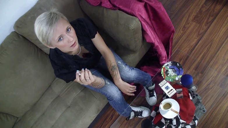Smoke it bitch: Sweet blonde loves smoking cigarettes on the couch