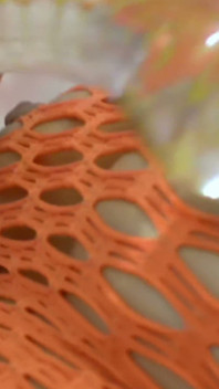 Glass Dildo Solo in an Orange Fishnet Bodysuit - Busty Brunette Plays on the Couch