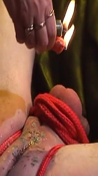 Mature Mistress Binds Masked Sub for Hot Wax Play