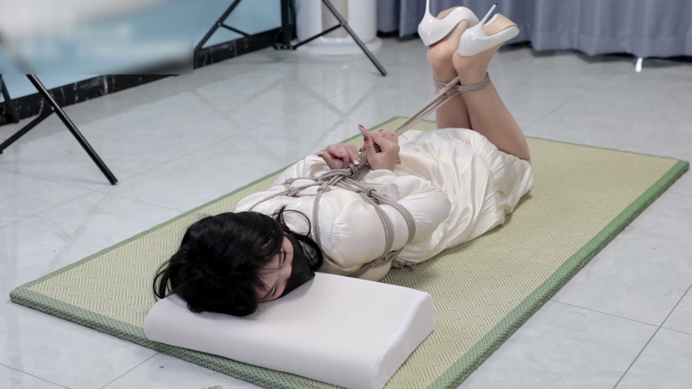 Asian bondage: Girlfriend in a Dress and Stockings, Bound by Rope