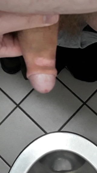 Thebavarianone: Playing with cock in a public toilet