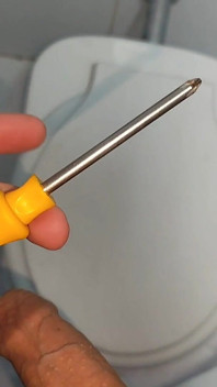 Young Straight Man Inserting the Tool Through the Glans.