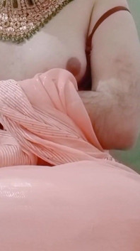 Indian Gay Crossdresser Gaurisissy Pressing Her Big Boobs and Fingering in Her Clean Shaved Big Ass in Red Saree