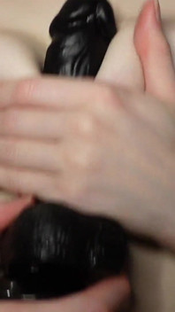 Blowjob on Black Dildo and Tittyfuck with It