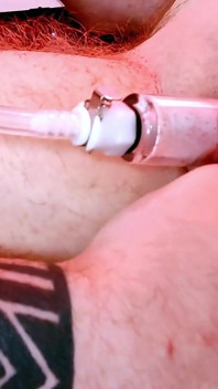 Trans Bear Gets His Clit Pumped by a Sexy Cub
