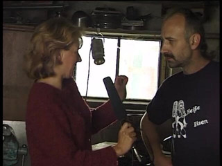 Lucky Cooch: Blonde interviewing a blacksmith