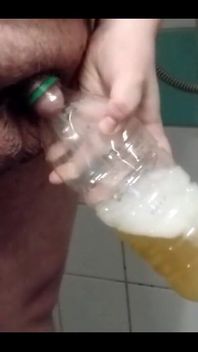 Superchub Pissing in Bottle