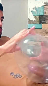 Fucking an inflated condom until I cum inside of it