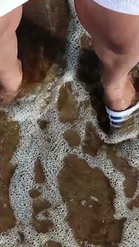 Feet and the Sea Extra Slowmotion - One Foot Barefoot and Foot in Slide - Great Feet in Sea