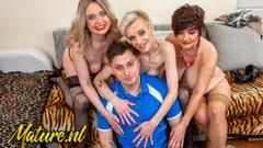 Lucky Young Guy Has His Hands Full with Three Cock Hungry Cougars!
