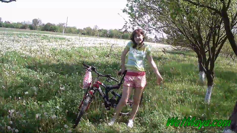 Wet Maya: Peeing on her bicycle