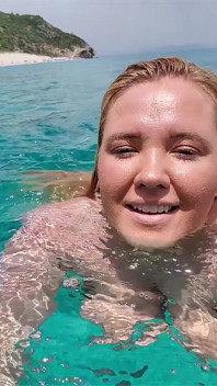Swimming in the blue waters of Greece butt naked...