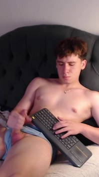 White Boy with Pink Cock Models Blue Boxers and Draws His Cock