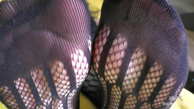 Mistress Legs: Toes wiggling in black mesh bodysuit