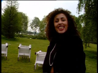 Lucky Cooch: Classy brunette babe gives an outdoor interview