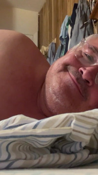Man Lying in Bed