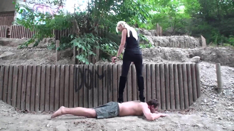 Femdom Austria: High heels trampling practice outdoors