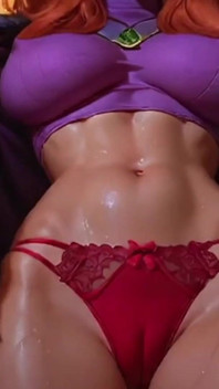 Danse sexy avec de gros seins et une culotte cameltoe