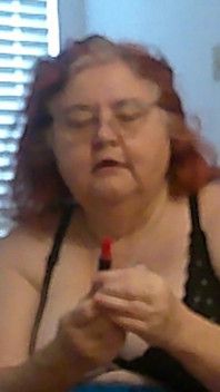 Mature BBW Redhead Nurse Vicki Talks to You as She Makes a Lipstick Applying Video for You!