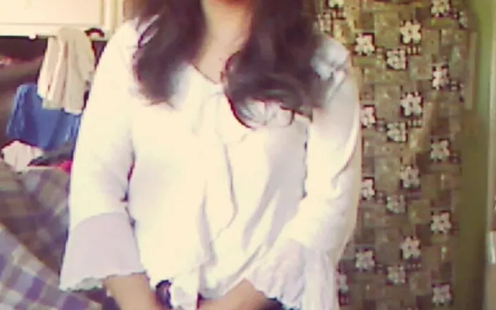 Jhazmeena: Jhazmeena Wearing a White Blouse and a Pleated Black Retro...
